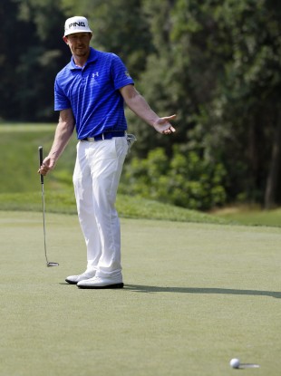Mahan reacts after narrowly missing a birdie-attempt on the 13th green.