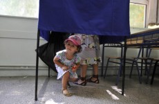 Early exit polls in Greece show top two parties in tie
