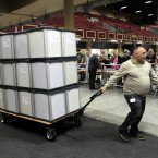 Electoral workers arrive with ballot boxes to be counted at the City West Hotel, Dublin. (AP Photo/Peter Morrison)