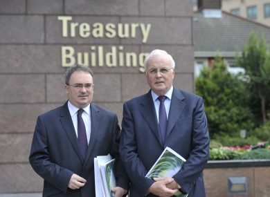 Chief Executive Brendan McDonagh and Chairman Frank Daly outside the Treasury Building in Dublin.
