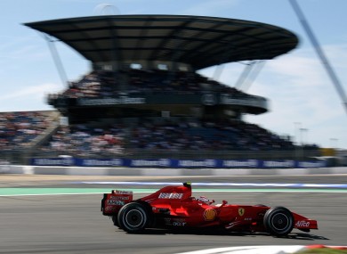 Kimi Raikkonen blasts past the main grandstand in 2007.