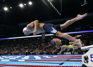 Michael Phelps dives at the start of the men's 200-meter freestyle final at the U.S. Olympic swimming trials last month.