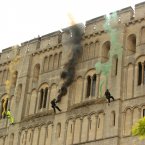 As the Olympic Flame run continues, it took an abseil down the side of Norwich Castle trailing coloured smoke this week. (Yui Mok/LOCOG/PA Images)