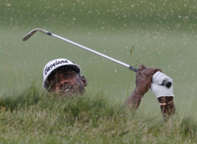 Singh chips out of the bunker at 17.