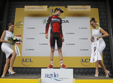 Tejay van Garderen of the US waits to recieve the best young rider's white jersey on the podium of the 13th stage.