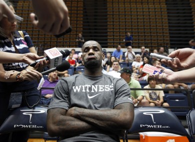 James takes questions from the media yesterday.