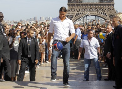 AC Milan striker Zlatan Ibrahimovic in front of the Eiffel Tower.