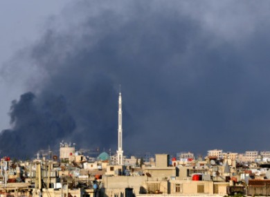 Smoke billowing over Damascus last week.