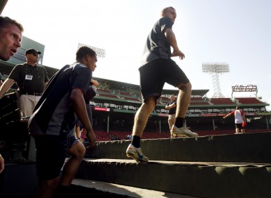 Liverpool players take to the Fenway turf for training yesterday.
