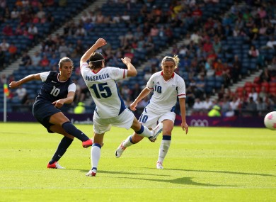 USA's Carli Lloyd scores against France.