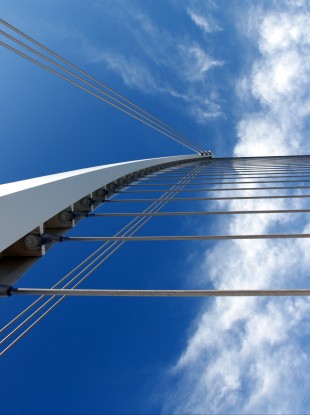 A (rare blue) skyward view of the 48-metre high Samuel Beckett Bridge.