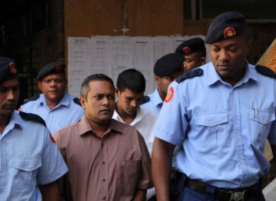 Sandip Mooneea and Avinash Treebhoowoon arriving in court yesterday.