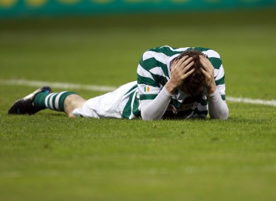 Hoops ace Gary Twigg holds his head after missing a chance against FK Ekranas on Tuesday night.