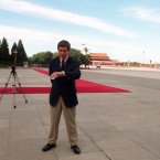 RTE Special Correspondent Charlie Bird checks the time at in Tianneman Square in Beijing China during the visit of Taoiseach Bertie Ahern in 1998 Pic: Photocall Ireland