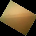 The landscape north of the rover showing the north wall and rim of Gale Crater. The quality of the image is likely due to dust on the lens' removable dust cover. The cover will be taken off in the coming weeks when technicians test the rover's robotic arm. (Image: NASA/JPL-Caltech/Malin Space Science Systems)