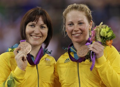 Australia's Kaarle McCulloch, right and teammate Anna Meares, show off their bronze medals.