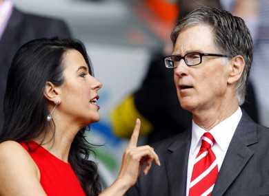 Liverpool director John W Henry and his wife Linda Pizzuti in the stands at Anfield last season.