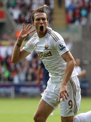 Swansea City's Miguel Michu celebrates scoring his side's second goal.