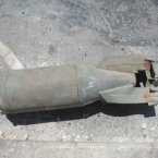 An unexploded Soviet-era unguided bomb, in the Sakhur district, Aleppo, Syria, August 2012.