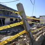 Damaged commercial shops after a explosion are seen on the surroundings of the Amuay refinery near Punto Fijo, Venezuela, Sunday, Aug. 26, 2012. Venezuelans who live next to the country's biggest oil refinery said they smelled a strong odor of sulfur hours before a gas leak ignited in an explosion on Saturday that killed at least 39 people and injured more than 80. (AP Photo/Ariana Cubillos)