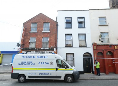 A team from the Garda technical bureau outside the house of Christopher Jackson on Prussia St.
