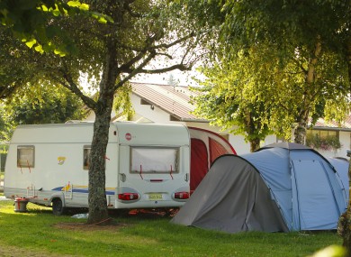 The caravan and tent used by the family while on holiday at the Le Solitare du Lac campsite