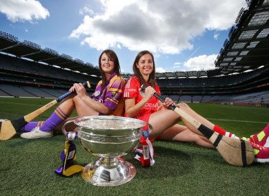 Wexford's Karen Atkinson with Cork's Julia White