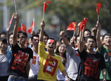 Chinese protesters with the words