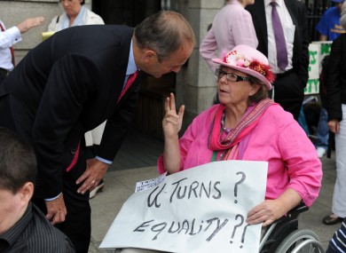 Dr Margaret Kennedy speaking to Fianna Fáil leader Micheál Martin at her protest outside Leinster House - one of her comments features in our pick of the week.