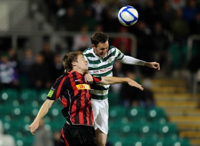 Rovers striker Gary Twigg rises higher than Bohs' Kevin Feely.