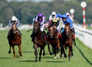 Mickael Barzalona and Encke beat hot favourite Camelot and Joseph O Brien to win the Ladbrokes St Leger Stakes during the Ladbrokes St Leger Festival.