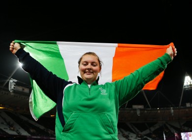 Ireland's Orla Barry celebrates her third place finish in the women's discus throw F57/58 at the Olympic Stadium.