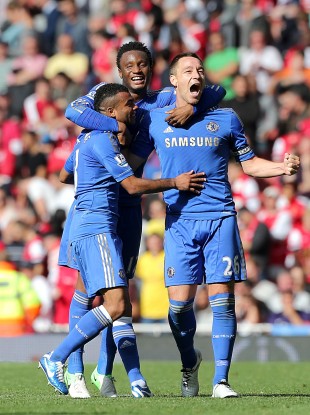 Chelsea's Ashley Cole, Mikel and John Terry (left to right) celebrate victory after the final whistle