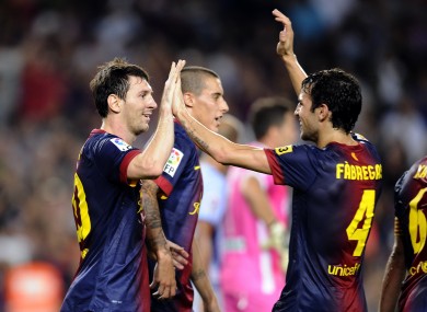 Leo Messi and Fabregas last night.