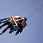 Afghan girls enjoy a ride on a ferris wheel in an amusement park in Kabul, Afganistan, as they celebrate Eid Al-Adha. (AP Photo/Anja Niedringhaus)