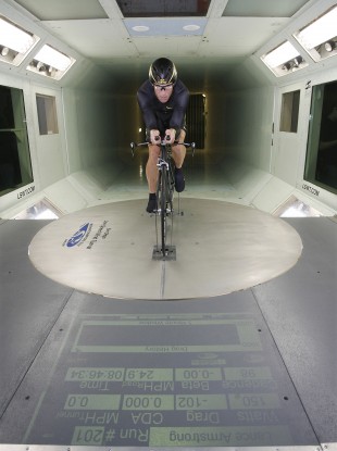 Armstrong warms up before riding a Trek prototype bicycle in 2008.