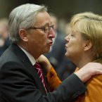 Angela Merkel puckers up to Luxembourg's Prime Minister Jean-Claude Juncker. Well, we suppose he isn't in her bad books. (AP Photo/Geert Vanden Wijngaert)