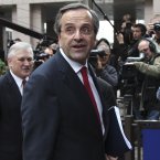 Another one who be getting any küssen's - Greek Prime Minister Antonis Samaras. (AP Photo/Yves Logghe)