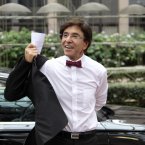 Belgium's Prime Minister Elio Di Rupo arrives in style for the EU summit in a wine coloured bow-tie. Dress sharp. Feel sharp. (AP Photo/Yves Logghe)
