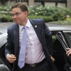 Finland's Prime Minister Jyrki Tapani Katainen arrives for the summit in his country's colours. Green washes Enda right out. (AP Photo/Yves Logghe)