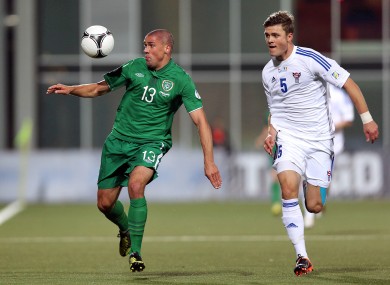 Ireland's Jonathan Walters and Rogvi Baldvinsson of Faroe Islands.