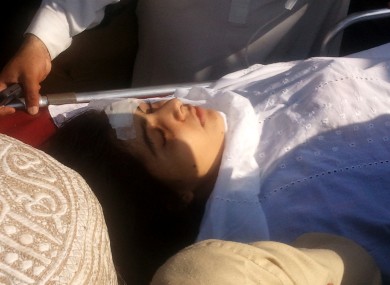 Malala Yousufzai is moved to a helicopter to be taken to Peshawar for treatment in Mingora, Swat Valley, Pakistan on Tuesday, Oct. 9, 2012.