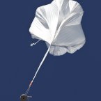 The capsule and attached helium balloon carrying Felix Baumgartner lifts off as he attempts to break the speed of sound with his own body by jumping from a space capsule lifted by a helium balloon.(AP Photo/Ross D. Franklin)