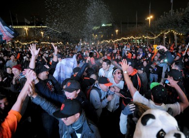 San Francisco Giants fans celebrate outside PacBell Park after their team won the 2012 Baseball World Series