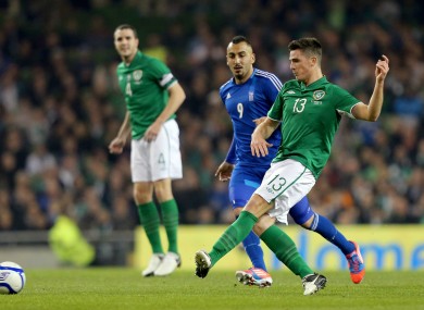 Greece Konstaninos Mitroglou and Ciaran Clark of Ireland