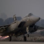 An Israeli air force jet fighter plane takes off from Tel Nof air force base for a mission over Gaza Strip in central Israel.
(AP Photo/Ariel Schalit)