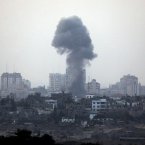 A plume of smoke is seen over central Gaza Strip, after an airstrike by Israeli forces, as seen from the Israel Gaza border.
(AP Photo/Lefteris Pitarakis)