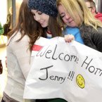 Jenny Flynn (23) from Navan is greeted by mother Jackie and sister Holly after traveling home from Singapore for Christmas today at Dublin Airport. Photo: Mark Stedman/Photocall Ireland