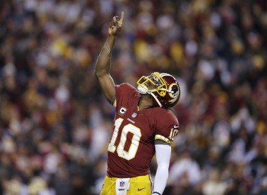 Washington Redskins quarterback Robert Griffin III celebrates a touchdown.