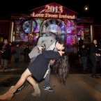 Oscar Vega and Sara Venture from Mexico kiss as Imelda May rang in the New Year. (Photo: Leon Farrell/Photocall Ireland)